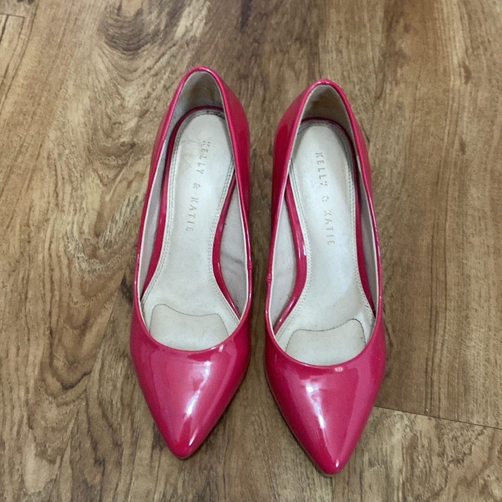 Bright pink 2 inch high heels. Worn once or twice. No scuff marks.